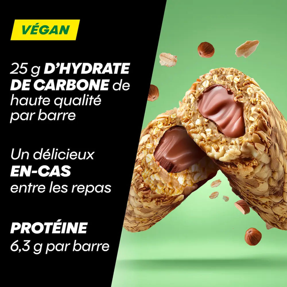 Barre Powerbar OAT Energy Nougat Noisettes ouverte avec cœur fondant, 25 g de glucides et 6,3 g de protéines
