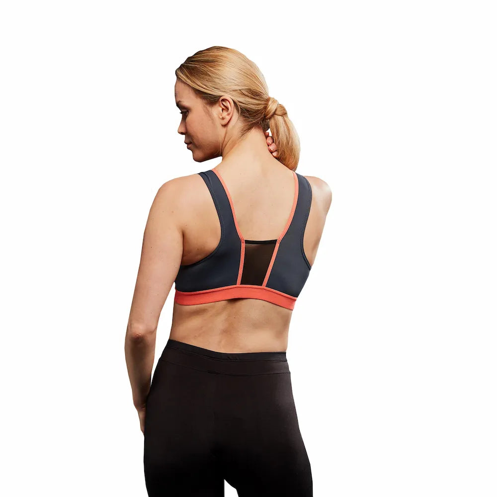 Brassière Activ Sport Bra Thuasne Sport gris et corail portée par une femme, vue de dos