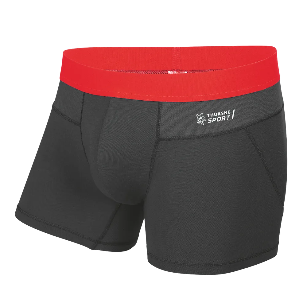 Boxer Tech Confort Thuasne Sport noir et orange vue trois-quarts avant