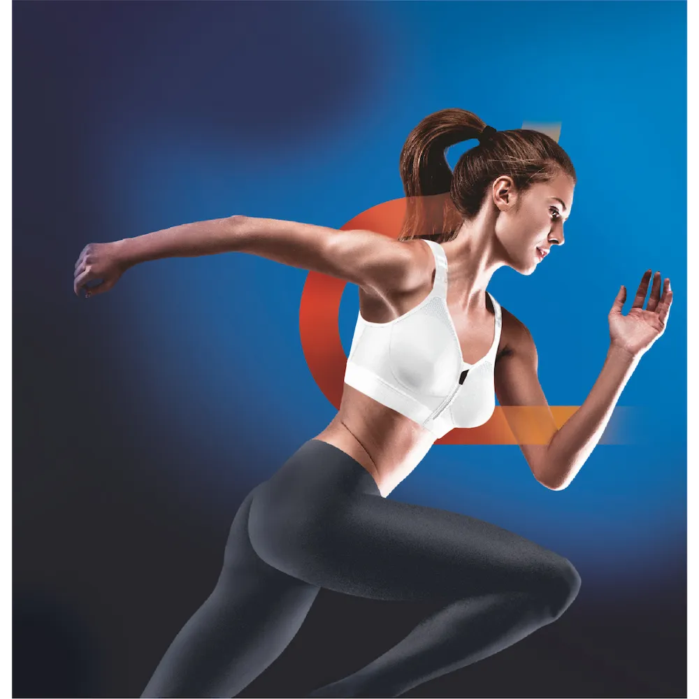 Femme en course portant la brassière Eaz'ip EVO Thuasne Sport blanche