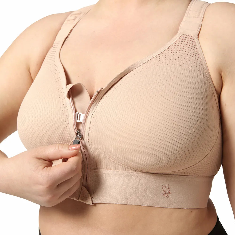 Détail du zip frontal de la brassière Eaz'ip EVO Thuasne Sport Nude