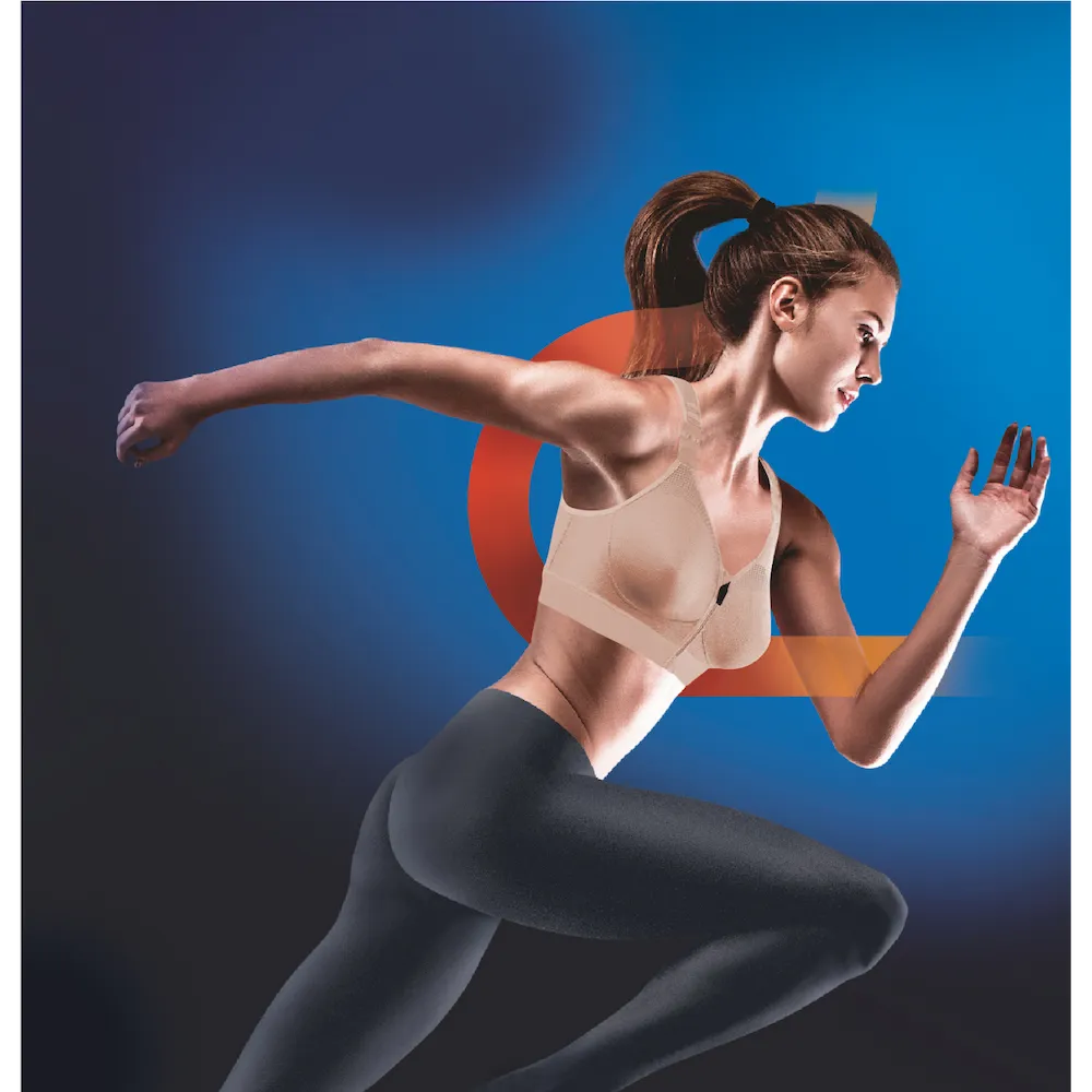 Femme en course portant la brassière Eaz'ip EVO Thuasne Sport Nude