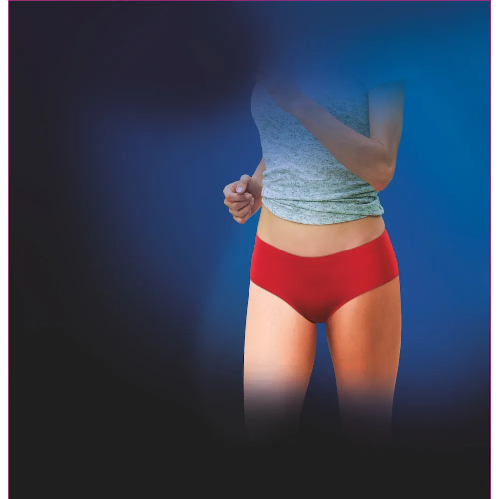 Sportive portant la culotte ThermoSeam Thuasne Sport rouge