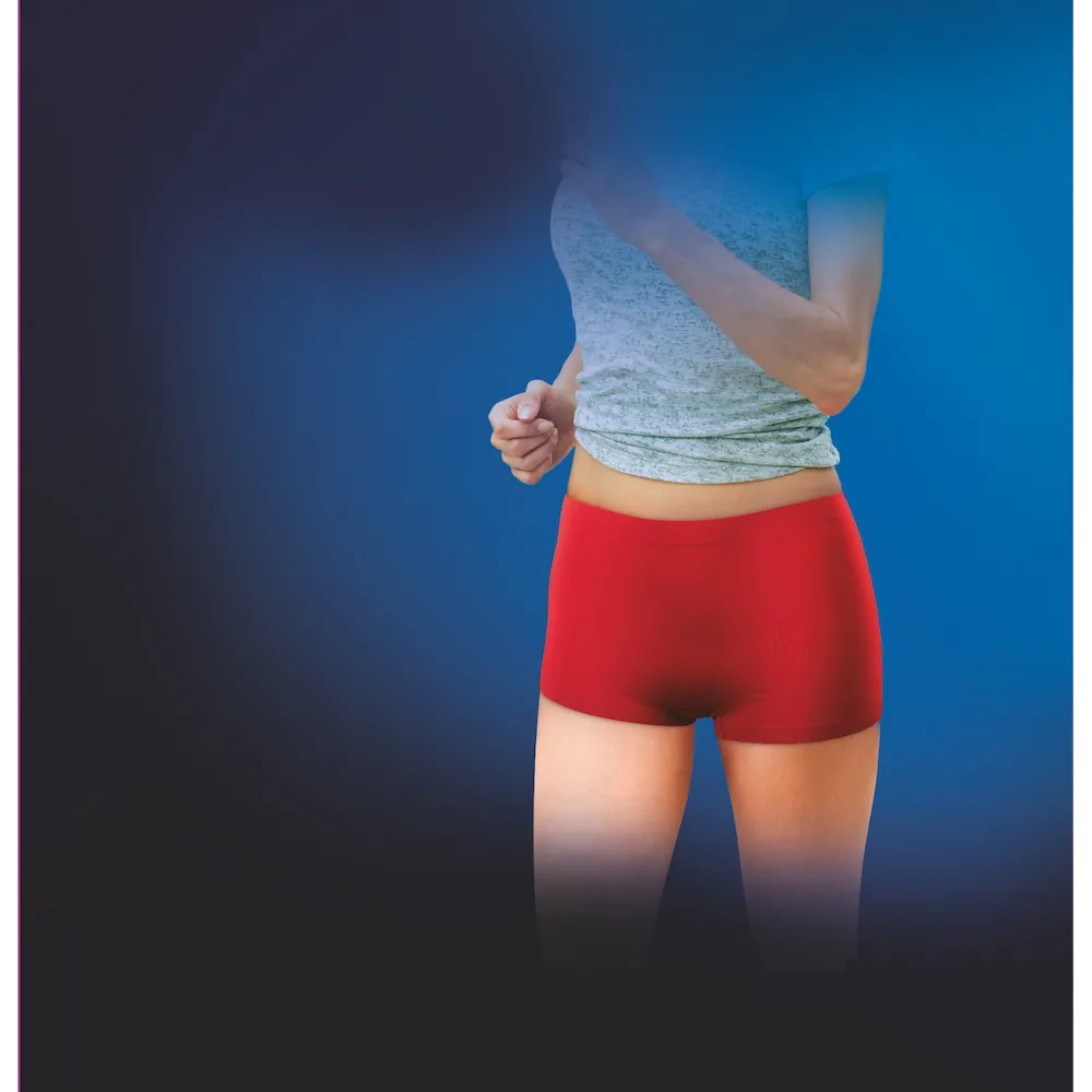 Sportive portant le shorty ThermoSeam Thuasne Sport rouge